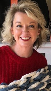 A photo of Anne Burkart is captured. She is a Marriage & Family Therapist. Anne is featured on the Practice of the Practice, a therapist podcast.
